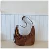 Bolso Pequeño Retro Coreano para Mujer 2026 Nuevo Diseño de Nicho Bolso Croissant para Viajar con Estilo Bolso de Hombro Único Cruzado Transfronterizo