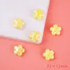 Color flor de cinco pétalos cerámica cuentas sueltas Macaron lindas cuentas perforadas pulsera collar DIY accesorios al por mayor