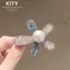 Elegante pinza para el pelo con pedrería floral estilo coreano 2026, pinza lateral para flequillo y cabellos sueltos, pinza de pico de pato a la moda, nueva herramienta de peinado