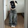 Jeans de camuflaje con estampado de estrellas de moda para mujer, con cintura alta, corte relajado, efecto adelgazante y diseño versátil de pierna ancha, perfectos para otoño