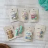 Ropa Infantil Zhe Li Pinzas para el Cabello de Niña Dulce 2026 Pasadores Infantiles de Dibujos Animados Flequillo Pinzas Bb Accesorios para el Cabello de Bebé Niña