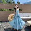 Conjunto de dos piezas estilo vacacional para viajar a Yunnan: top tipo tubo y falda, hermoso atuendo de verano