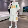 Traje Deportivo Casual de Verano para Hombre, Nuevo Conjunto de Camiseta de Manga Corta y Pantalones Cortos con Retazos Estilo Hong Kong, Holgado, Elegante y Moderno