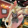 Moda de Alta Gama Arcilla Pedrería Bulldog Francés Cadena de Perlas Llavero Cadena Creativa de Pata Chapado Perro Pequeño Colgante para Coche