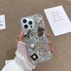 Estuche con lazo de diamantes de 5 caracteres para Apple 16Pro, estuche con diamantes de imitación para Apple 15/14P, anticaídas y todo incluido.