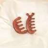 Peine Monstruo de Sándalo Rojo Peine Multifuncional para Masaje del Cuero Cabelludo Pequeño Portátil Terapia Casera Gua Sha Peine para el Cuero Cabelludo