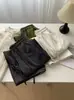 Pantalones casuales de lana de acetato con estampado de carambola de nueve puntos para mujer, estilo coreano otoño/invierno 2026, engrosados, dobladillo enrollado, cintura alta, caída, pantalones de abuela, nuevos