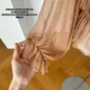 Top texturizado estilo francés de amarre para principios de otoño, blusa de rayón de manga larga con volantes y cuello cuadrado de amarre para mujer en color canela nude y otros colores