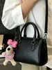 Bolso de mano único y elegante para mujer, nueva moda primavera 2026, bolso Boston tipo almohada, bolso casual de hombro cruzado