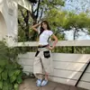 Jeans retro americanos con estampado de leopardo para mujer, diseño de bolsillo de verano, pantalones rectos cropped holgados de alta costura