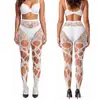 Medias sexys de encaje rasgadas irregulares de red de pescado SHEIN para mujer sexy caliente, pantimedias negras caladas