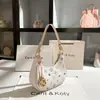 Diseño de Nicho Dropshipping Color Contrastante Bolso Baguette Bordado 2025 Nuevo Bolso de Axila de Media Luna de Gama Alta Venta al por Mayor
