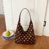 Bolso de mano con lunares estilo moda coreana transfronterizo para mujer, nuevo y versátil bolso de mano y bolso de hombro para uso diario 2026