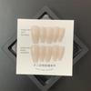 Las yemas de los dedos de Yi, armadura usada a mano para mostrar blanco y suave para estar desnudo, arte de uñas de color sólido, producto terminado, pegatinas de uñas removibles, uñas postizas