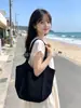 Bolsa de mão de tricô transfronteiriça recém-lançada, bolsa de tricô durável com estampa de letras, bolsa feminina de grande capacidade, bolsa de ombro e transversal de cor sólida