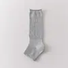 Calcetines de mujer apilados huecos de media longitud para principios de otoño, estilo fresco y dulce, calcetines largos apilados, simples y versátiles, estilo coreano