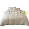 Juego de cuatro piezas de gasa de doble capa bordada en tono crema estilo francés 100S de algodón lavado, algodón puro, suave y agradable para la piel, adecuado para todas las estaciones