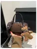 Bolsa Pequeña Nueva Retro Estampado de Leopardo Otoño/Invierno 2025 para Mujer Bolso Cruzado Casual Versátil Bolso de Mano de Gamuza Bolso Cubo