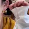 Pendientes geométricos tipo cubo de lujo ligero y alta gama, exquisito color café, pendientes versátiles de moda populares para mujer 2026