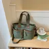 Bolsa Feminina de Veludo de Grande Capacidade 2026 Verão Nova Estilo Coreano Simples de Ombro Transversal com um Toque Relaxado e Único