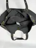 Bolsa vintage de gran capacidad, nuevo modelo verano 2026, alto valor estético, bolso de hombro de color sólido, bolsa de mano casual para el trabajo y los desplazamientos