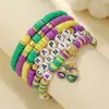 Pulseira musical de carnaval em vidro mardi popular transfronteiriça, conjunto de pulseiras empilhadas multicamadas de argila macia com letras