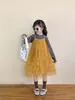Colección Primavera 2026 Nuevo Estilo Coreano Ropa Infantil Niñas Vestido de Pastel con Tirantes Amarillos Dulce Vestido de Tutú con Tirantes Abullonados