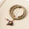 Sándalo verde DIY anillo de correr pulsera especificaciones 0.6 para hombre y mujer estilo simple cuentas Wen jugar joyería fabricantes al por mayor cuentas de Buda