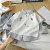 Sudadera Infantil Temporada Primavera y Otoño 2026 Niños y Niñas Dibujos Animados Falso Dos Piezas Patchwork Pulóver Camiseta de Manga Larga para Niños Pequeños Moderna