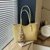Bolso de hombro nuevo para mujer 2026 transfronterizo, bolso tote simple y casual, gran capacidad, estilo retro, adecuado para la escuela y el trabajo