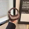 2025 Moda Transfronteriza Nueva Europea y Americana Bolso de Mano de Cuerda para Banquetes Cadena Acrílica Bolso Cruzado al Hombro para Noche para Mujeres