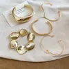 Conjunto de pulseiras de pérola redonda com contas transfronteiriças europeias e americanas, design versátil, pulseira aberta, sensação moderna e de alta qualidade