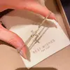 Pulsera con colgante de cruz de circonita cúbica chapada en oro de 18k, una pulsera lujosa y elegante de estilo vintage que complementa cualquier atuendo