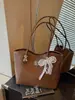 Bolsa de Hombro Cruzada Estilo Retro Francés para Viajes Diarios Otoño 2026 Nuevo Patrón Tejido para Mujer