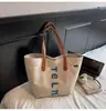Bolso de Lona de Gran Capacidad 2025 Verano Nuevo Bolso de Hombro Bolso Tote Casual Bordado de Letras Moderno para Viajeras Bolso de Mujer