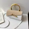 Bolsa de Mão Estilo Transfronteiriço para Mulheres Verão 2026 Nova Bolsa de Ombro de Couro PU Patchwork Luxuosa Bolsa Transversal Versátil para o Dia a Dia
