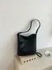 Bolsa de Palha Verão 2026 Design de Nicho Bolsa de Mão para Mulheres Sensação de Alto Padrão Bolsa Saco Bolsa de Ombro Bolsa Transversal Estilo Ins
