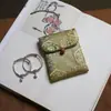 Muestra de pedido final se puede pedir bolsa de tela de brocado para regalo bolsa Wenwan estilo japonés bolsa de almacenamiento de joyas billetera plegable tela