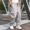 Outono 2024 Novo Casual Cor Sólida Solto Etiqueta de Couro Múltiplos Bolsos Calça de Grou Calça Básica Calça Casual Plus Size