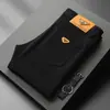 Marca Italiana de Alta Qualidade Tendência Outono e Inverno Juventude Elástico Slim Reto Jeans Preto Estampado de Veludo Espessado para Homens