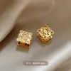 Novos Brincos Coreanos 2026 Mais Vendidos Geométricos Vazados com Pedras de Diamante para Mulheres Design de Nicho Brincos Dourados de Alta Qualidade