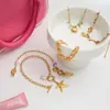 Pulsera Wanxing Estilo Europeo y Americano Acero Inoxidable Chapado en Oro de 18 Quilates Temática Oceánica con Conchas y Estrellas de Mar, Bestseller Transfronterizo, No se Desvanece, Pulsera Versátil