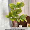 Parede de fundo de planta verde artificial com folha de ouro roxo, arranjo floral, folhas de plantas, paisagismo decorativo, ornamentos em vasos, adereços de fotografia