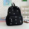 Moda Transfronteriza Estilo Coreano Estudiante Alta Apariencia Bordado de Moño Fresco y Ligero Mochila de Gran Capacidad