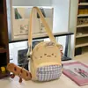 Bolsa transversal fofa para mulheres, estilo coreano, design de nicho, moderna, macia e adorável, pequena mochila, design de desenho animado, perfeita para passeios