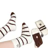 Calcetines cálidos con lazo para otoño e invierno para mujer, calcetines de media pantorrilla para mujer de terciopelo australiano con flores pequeñas, calcetines deportivos versátiles de estilo japonés con rayas y forro polar