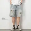 Pantalones cortos de mezclilla casual de estilo americano para hombre, frescos, retro, desgastados, rotos, holgados y versátiles, pantalones de cinco puntos de moda callejera