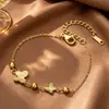 Nuevo brazalete de mariposa dorada estilo chino para mujer, nuevo modelo 2026, lujo ligero vintage, sensación de alta gama, nicho, exquisito, versátil y elegante