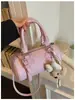 Bolso pequeño súper moderno y exquisito para mujer, nueva colección 2026, con un toque de alta gama, perfecto para el verano y el uso diario, un elegante bolso de hombro o bandolera.