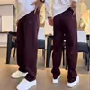 Pantalones deportivos de punto para hombre a la moda, nuevo estilo otoño e invierno 2025, corte holgado, pantalones casuales negros para correr